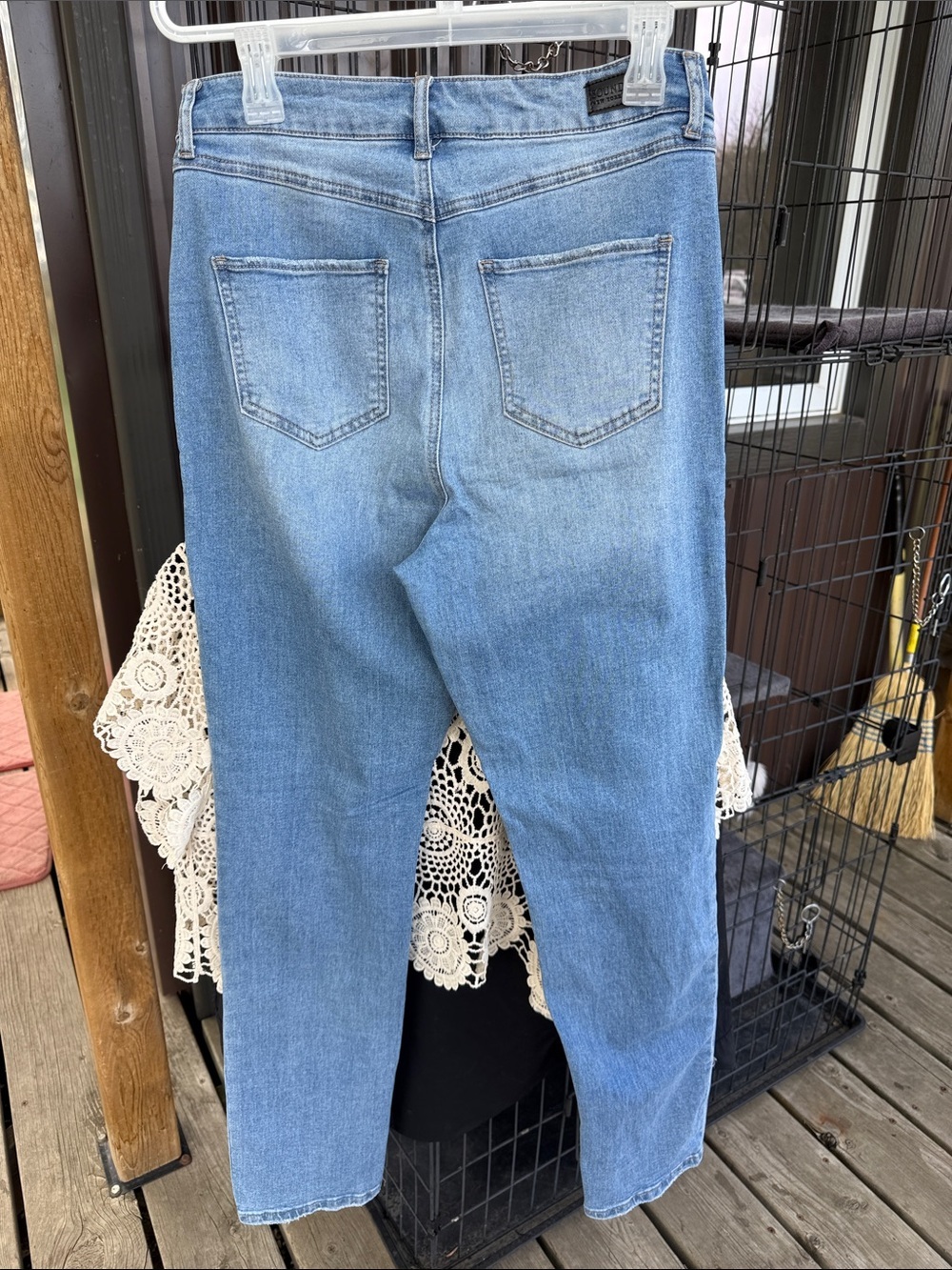 High-Rise Light Blue Distressed Women's Jeans - Picture 5 of 13